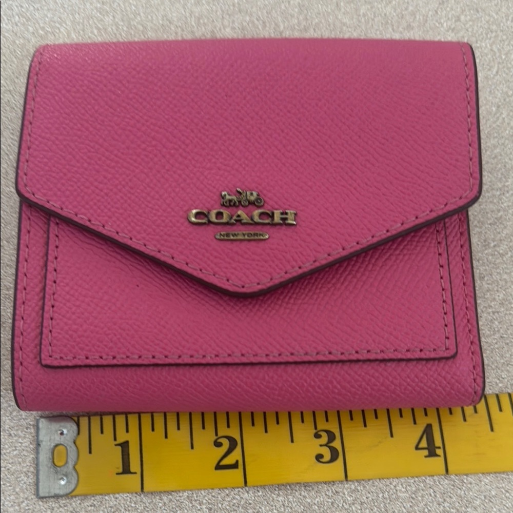 Coach Pink Leather Wallets with Signature Logo
